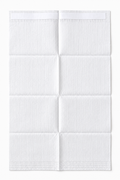 An unfolded Medico Disposable Clothing Protector / Bib